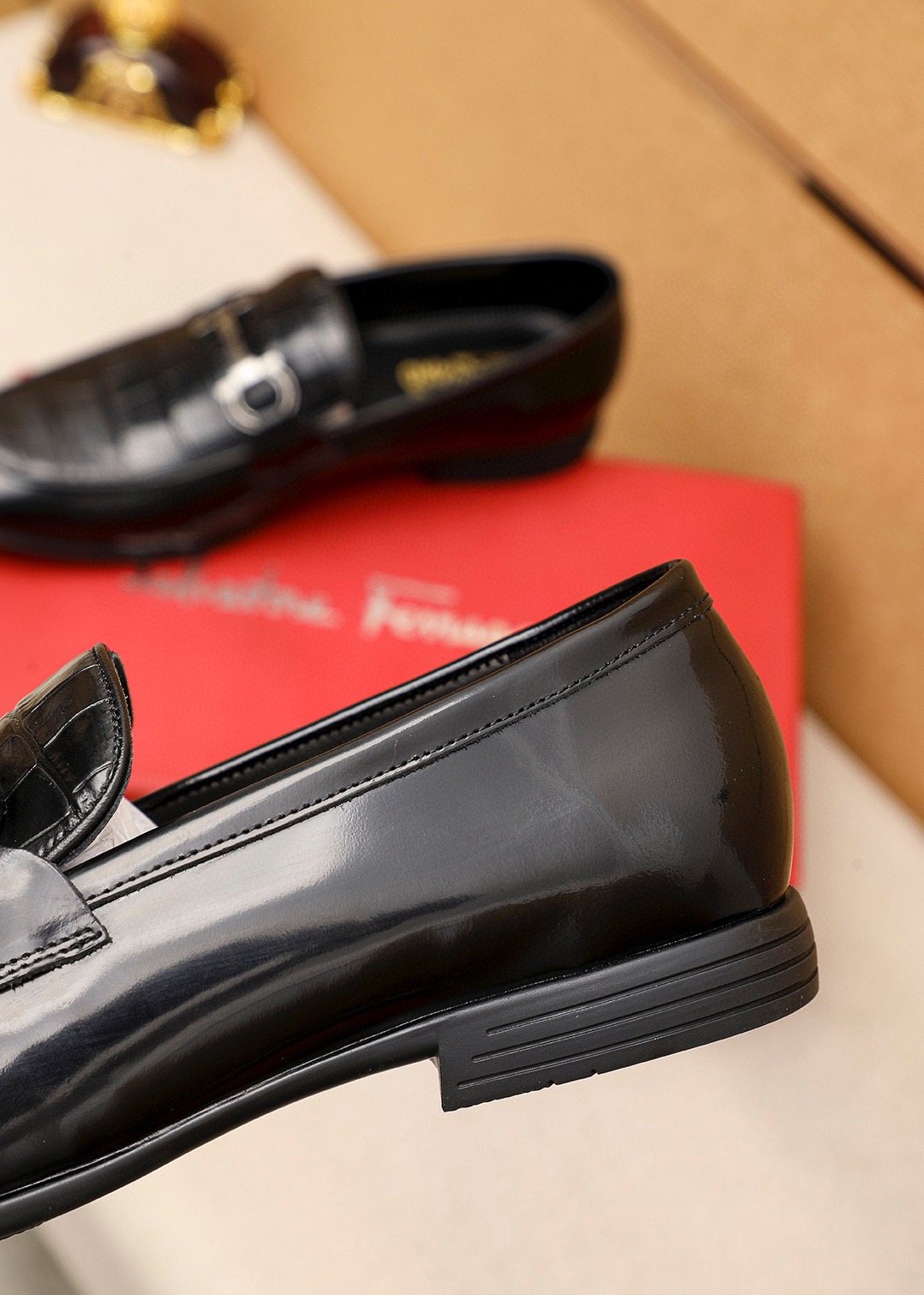 Ferragamo Black Embossed Buckle Loafers - Metal-Tone Vamp Buckle