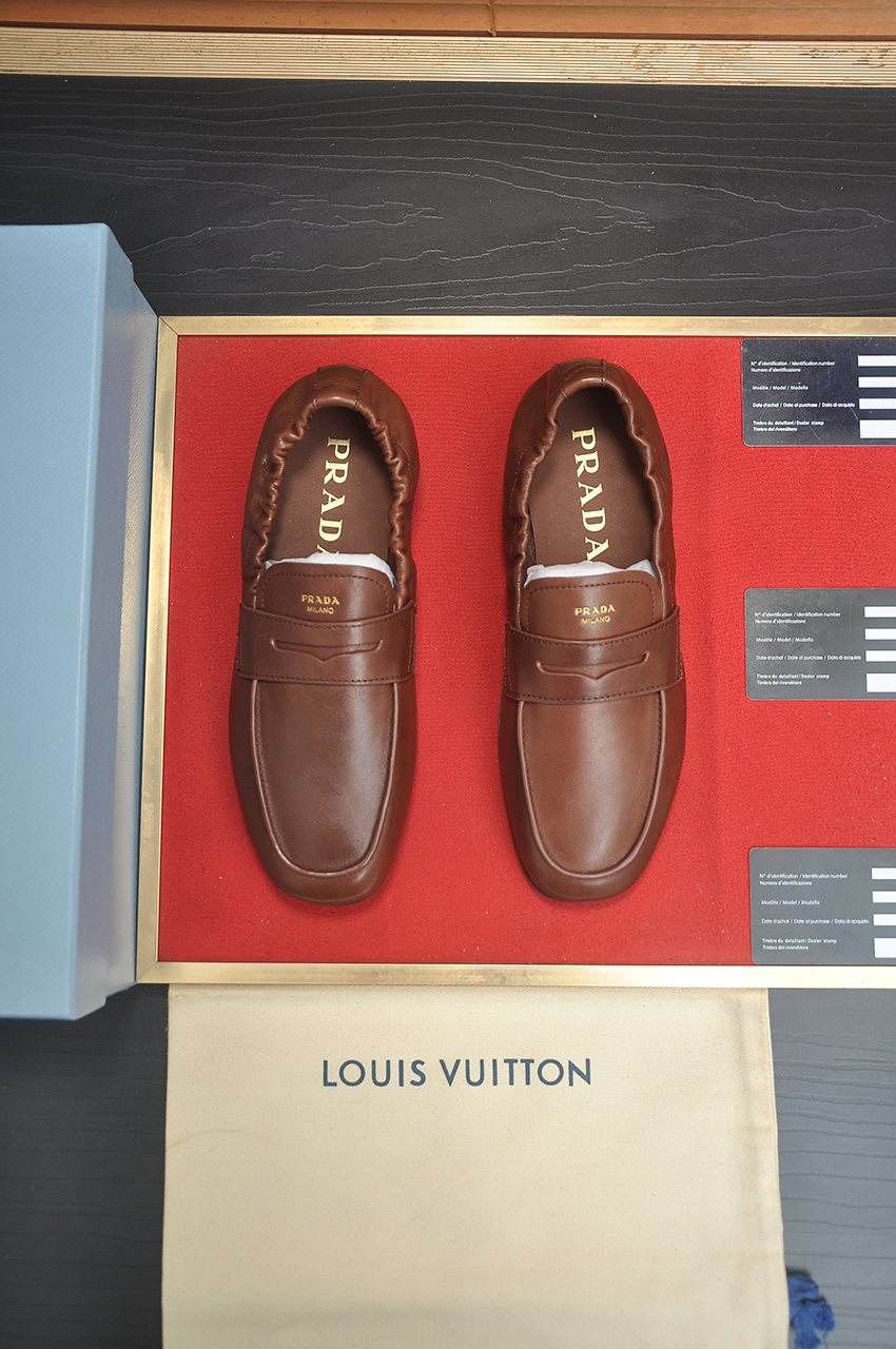 Prada Strap-Detail Slip-On Loafers